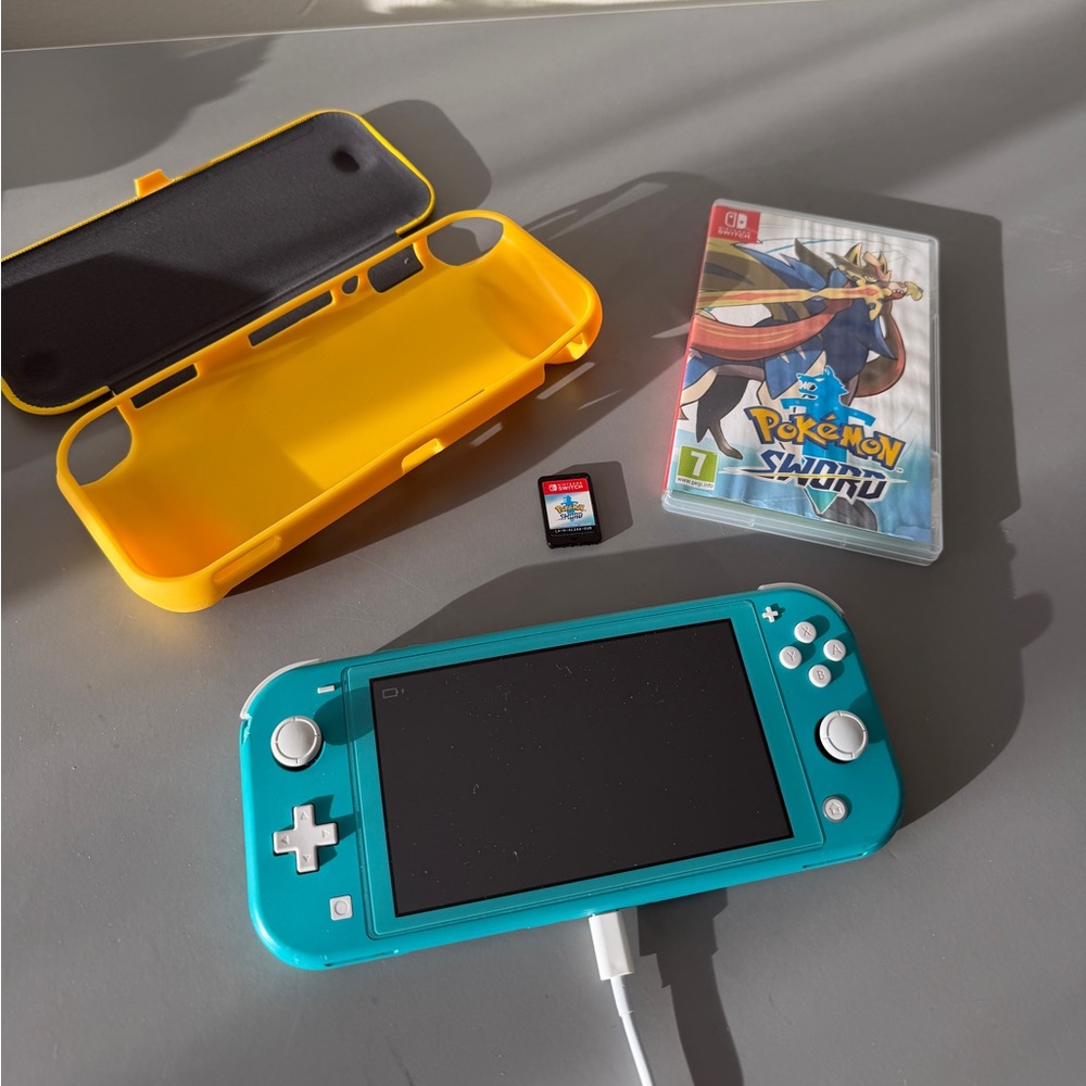 Teal Nintendo Switch Lite with Pokémon Sword